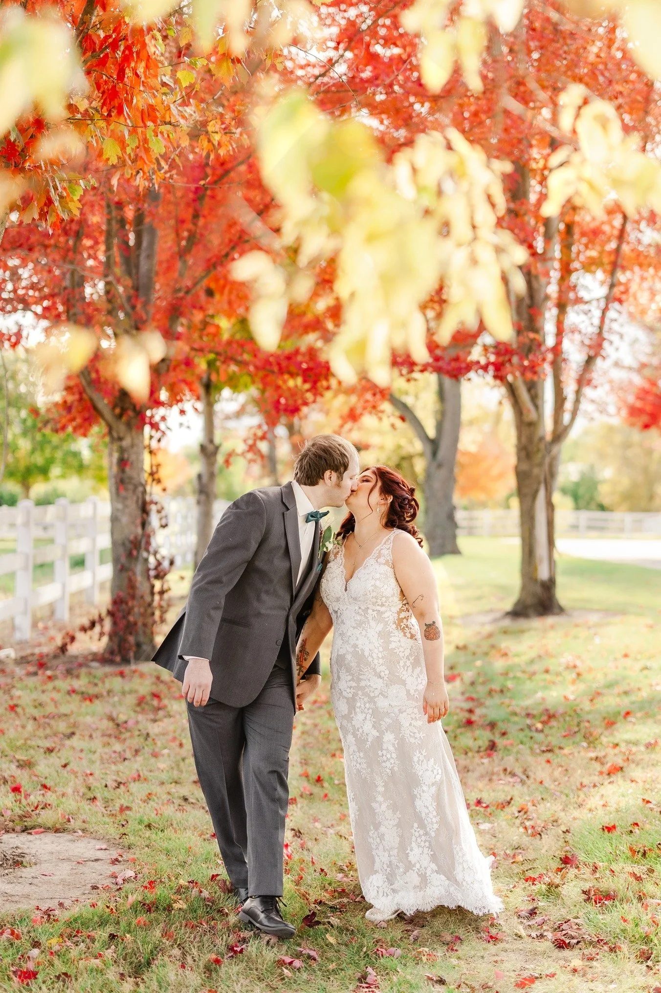 Wedding couple in fall foliage setting